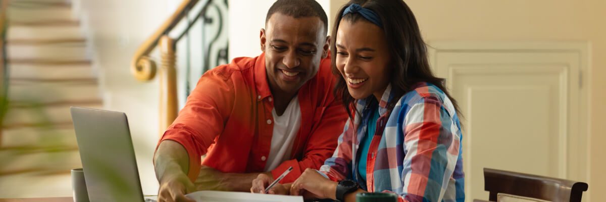 smiling-african-american-couple-discussing-on-fina-2022-01-31-18-22-32-utc.jpg